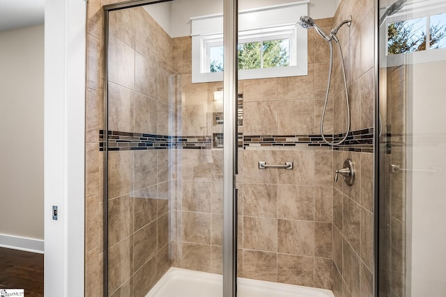 bathroom featuring an enclosed shower