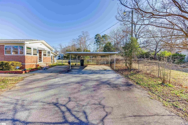 view of front of home featuring a carport