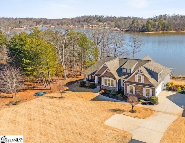 view of front of property with a water view