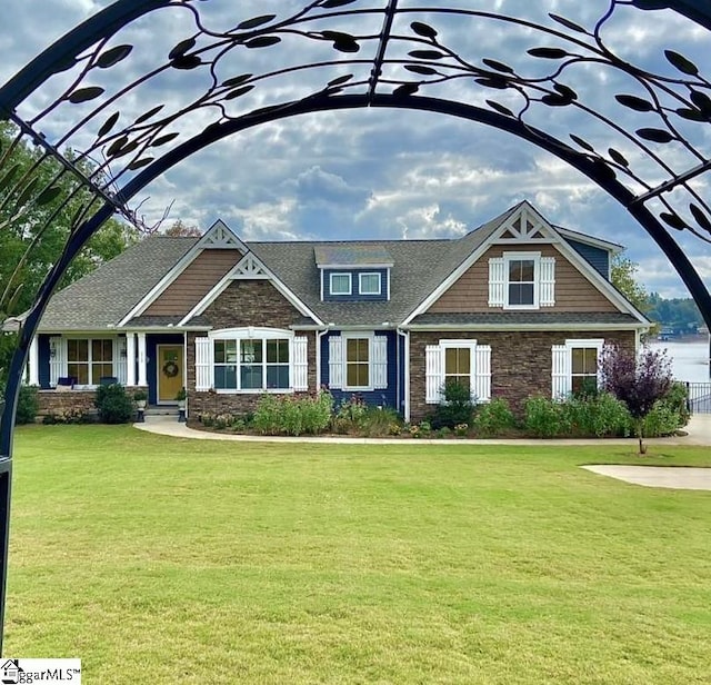 view of front of home with a front yard