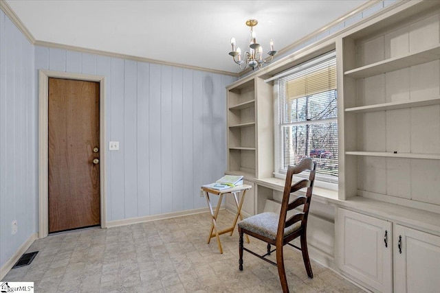 office with an inviting chandelier, baseboards, visible vents, and crown molding