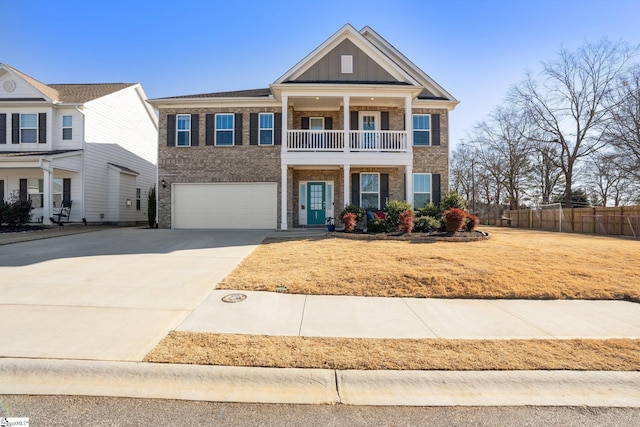 greek revival inspired property featuring brick siding, board and batten siding, concrete driveway, a garage, and a balcony