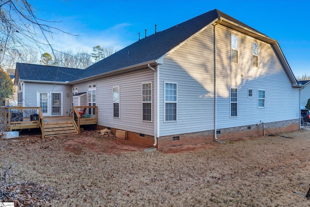 rear view of property with a deck