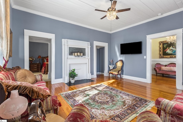 living room featuring ceiling fan, wooden ceiling, ornamental molding, and hardwood / wood-style flooring