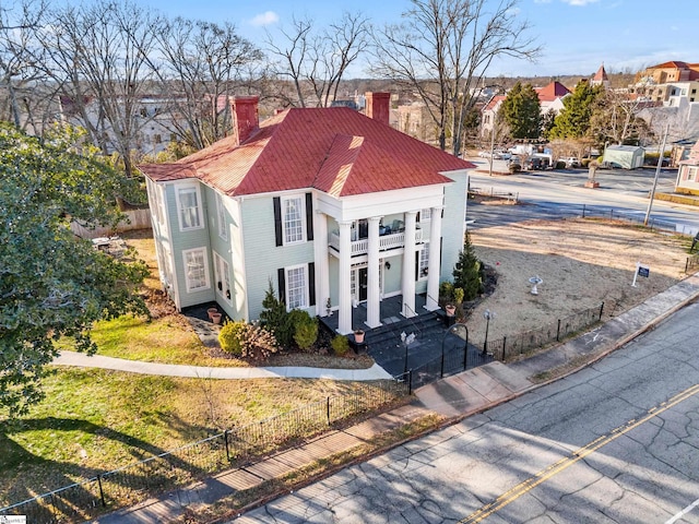 view of front of property with a balcony