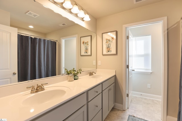 bathroom featuring vanity