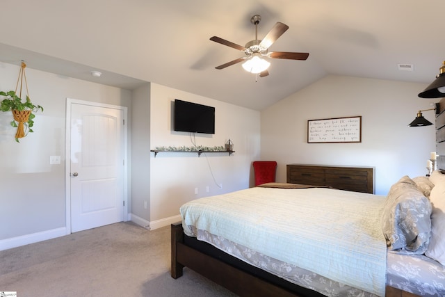 carpeted bedroom featuring vaulted ceiling and ceiling fan