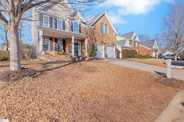 view of front of home featuring a garage and a porch