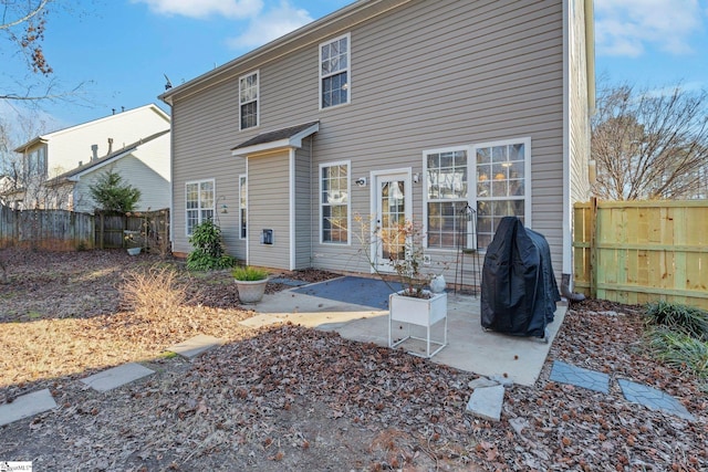 rear view of house featuring a patio