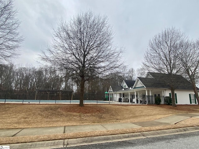 view of home's community with a swimming pool