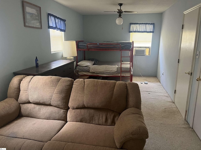 carpeted bedroom featuring ceiling fan, cooling unit, and multiple windows