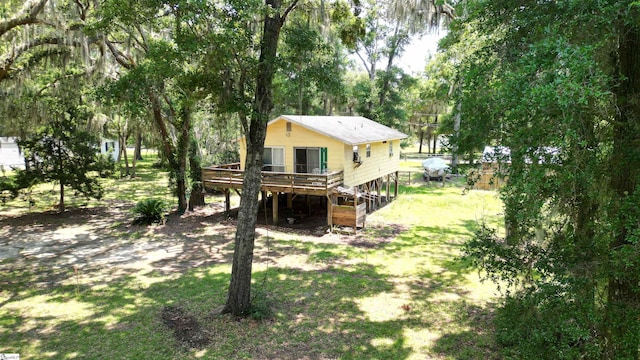 view of yard with a wooden deck