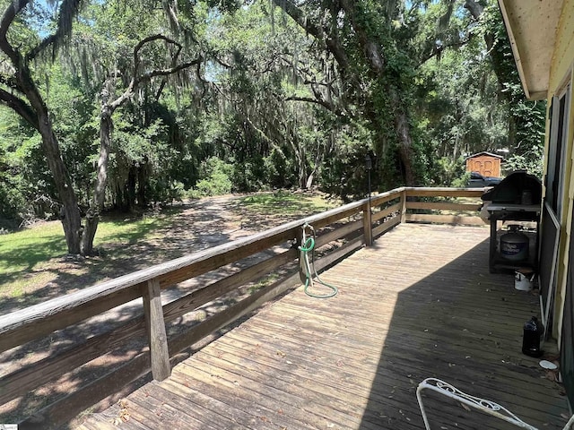 wooden deck with area for grilling