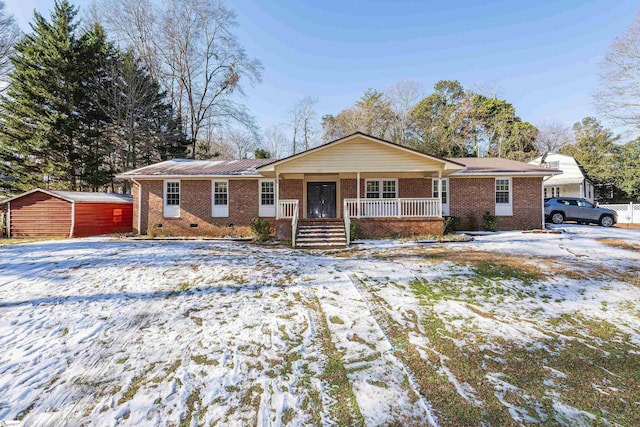 single story home with a porch