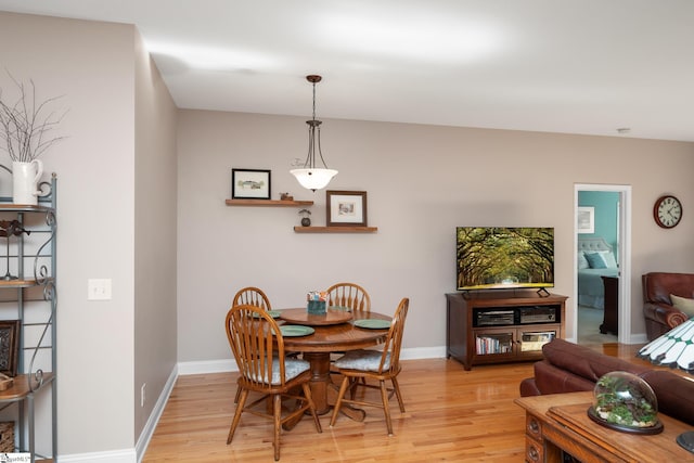 dining room with light hardwood / wood-style floors