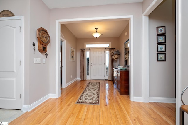 foyer entrance featuring light hardwood / wood-style flooring