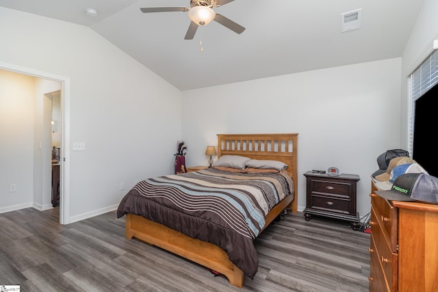 bedroom with dark wood-type flooring, ceiling fan, and vaulted ceiling