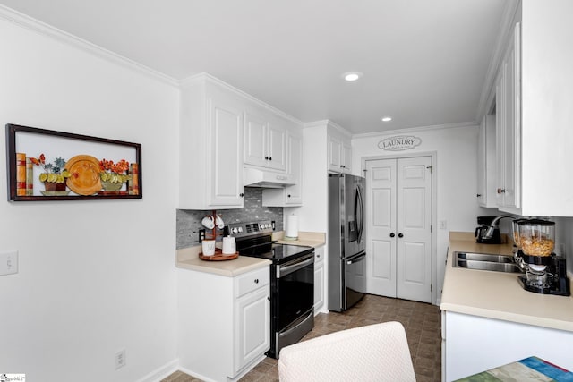 kitchen with refrigerator with ice dispenser, white cabinetry, sink, ornamental molding, and stainless steel electric range oven