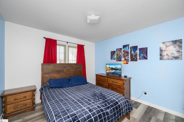 bedroom featuring hardwood / wood-style flooring