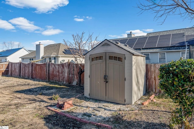 view of outdoor structure with solar panels