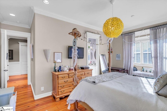 bedroom featuring wood-type flooring and ornamental molding