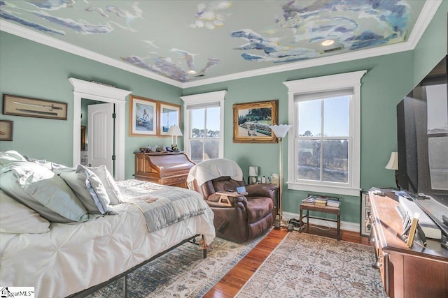 bedroom with wood-type flooring and ornamental molding