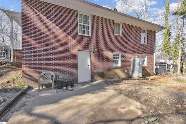 back of property with a patio area