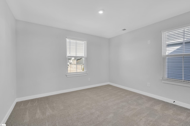 view of carpeted spare room