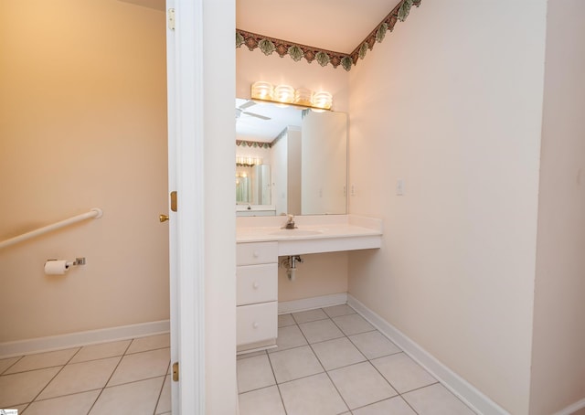 bathroom with tile patterned flooring and sink