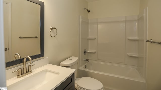 full bathroom featuring toilet, vanity, and shower / washtub combination