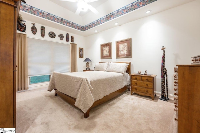 carpeted bedroom with ceiling fan