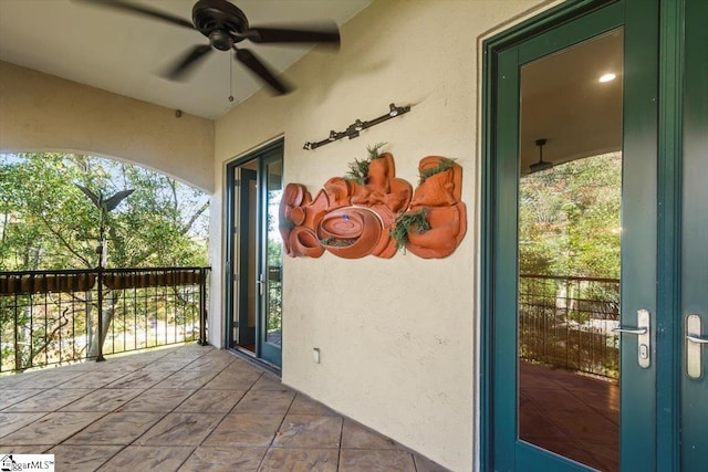 exterior space with ceiling fan and french doors