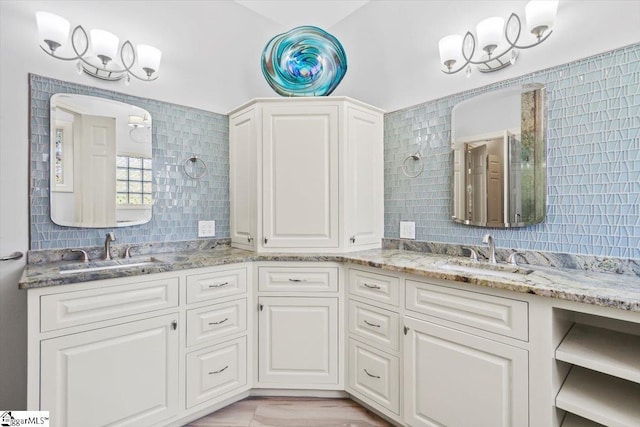 bathroom with backsplash and vanity