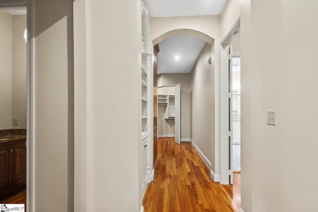 hallway featuring light wood-type flooring