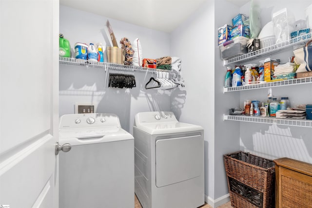 laundry area featuring washing machine and dryer