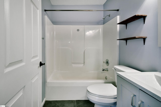 full bathroom with toilet, vanity, tile patterned floors, and shower / tub combination