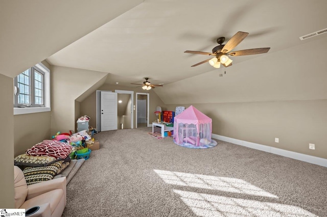 rec room featuring vaulted ceiling, ceiling fan, and carpet floors