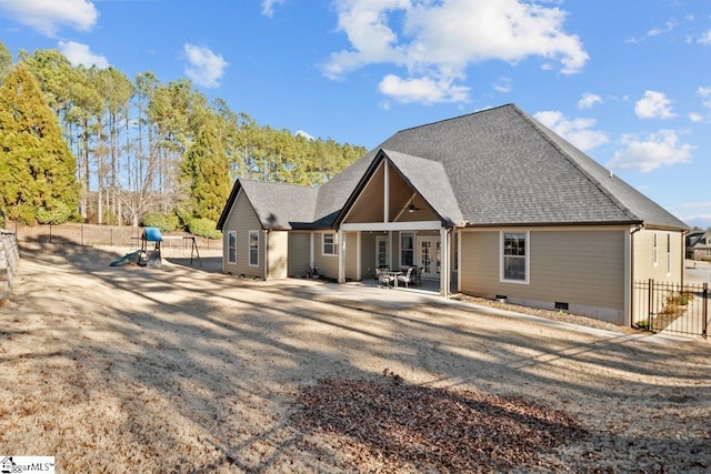 back of property featuring a patio area