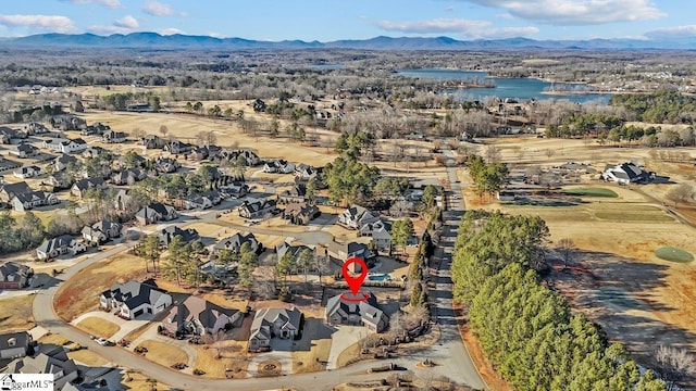 aerial view with a water and mountain view