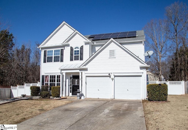 view of front of property with solar panels