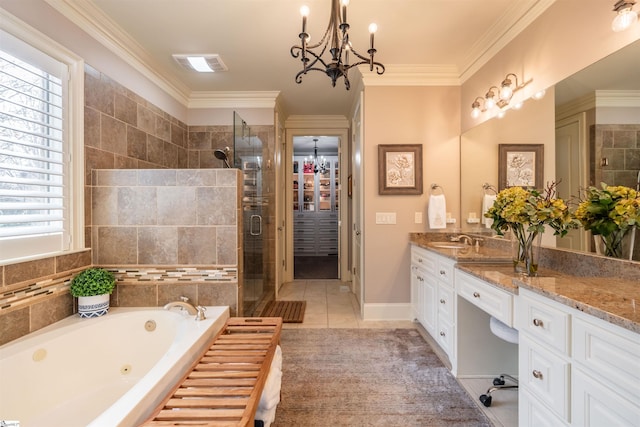 bathroom with vanity, plenty of natural light, tile patterned floors, and shower with separate bathtub