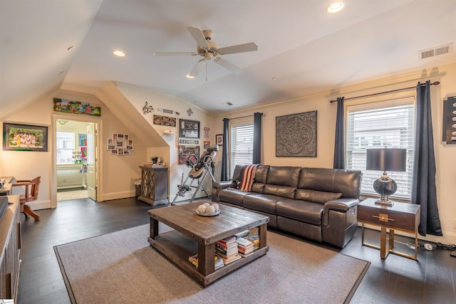 living room with ceiling fan, vaulted ceiling, dark hardwood / wood-style flooring, and plenty of natural light