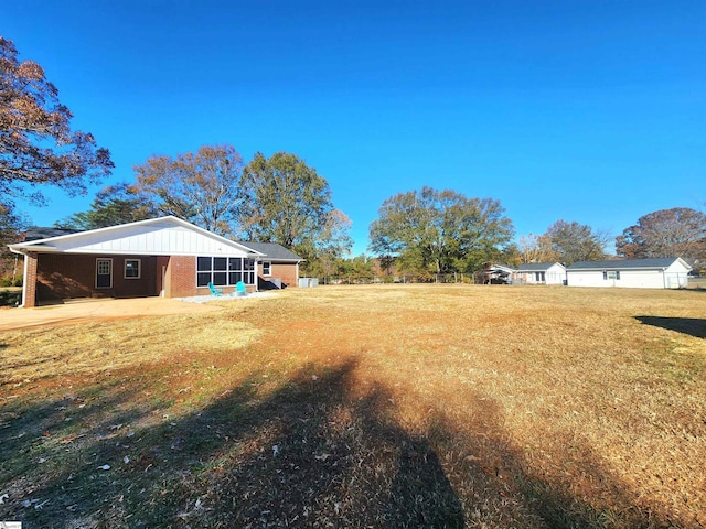 view of yard featuring a carport