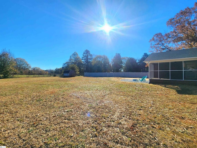 view of yard with a sunroom