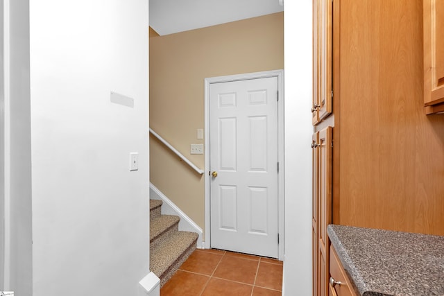 interior space featuring light tile patterned floors