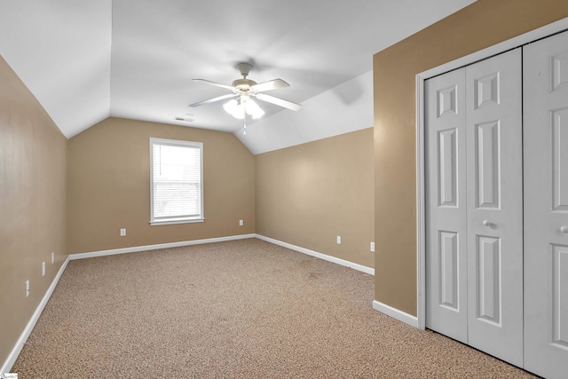 bonus room featuring ceiling fan, lofted ceiling, and carpet flooring