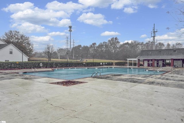 view of pool featuring a patio area