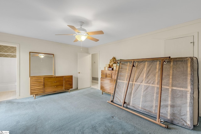 unfurnished bedroom with ceiling fan, crown molding, connected bathroom, and carpet floors