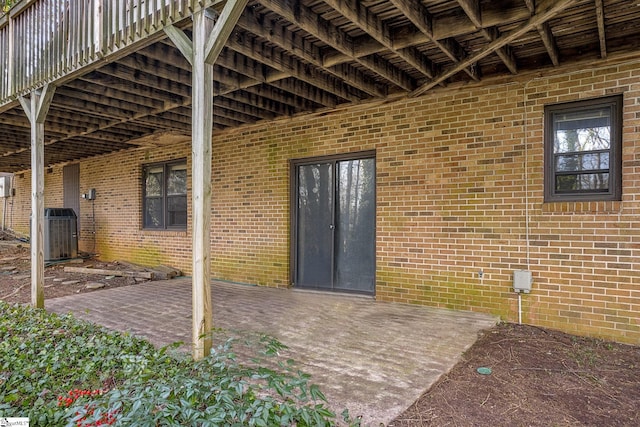 view of patio with central AC