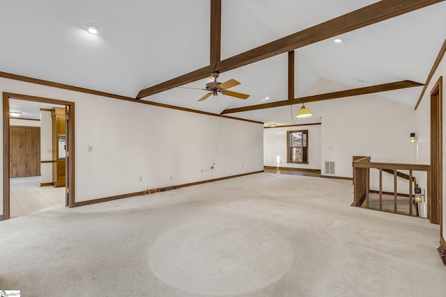 unfurnished living room featuring ceiling fan, vaulted ceiling with beams, and light carpet